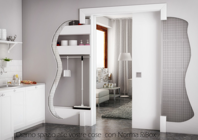 Norma RiBox è un controtelaio per porte scorrevoli a scomprsa che all'occorrenza diventa una dispenza
